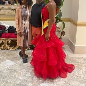 Red sparkle/sequin prom/pageant dress. Flower embellishments.